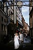 Bride and Groom walking in Matthew Street at Hard Days Night Hotel Liverpool