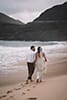 Beach elopement bride and groom 