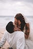 Beach elopement bride and groom