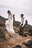 Bride and groom adventure hiking elopement in Hawaii