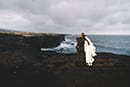 Newly weds along sea cliffs in hawaii